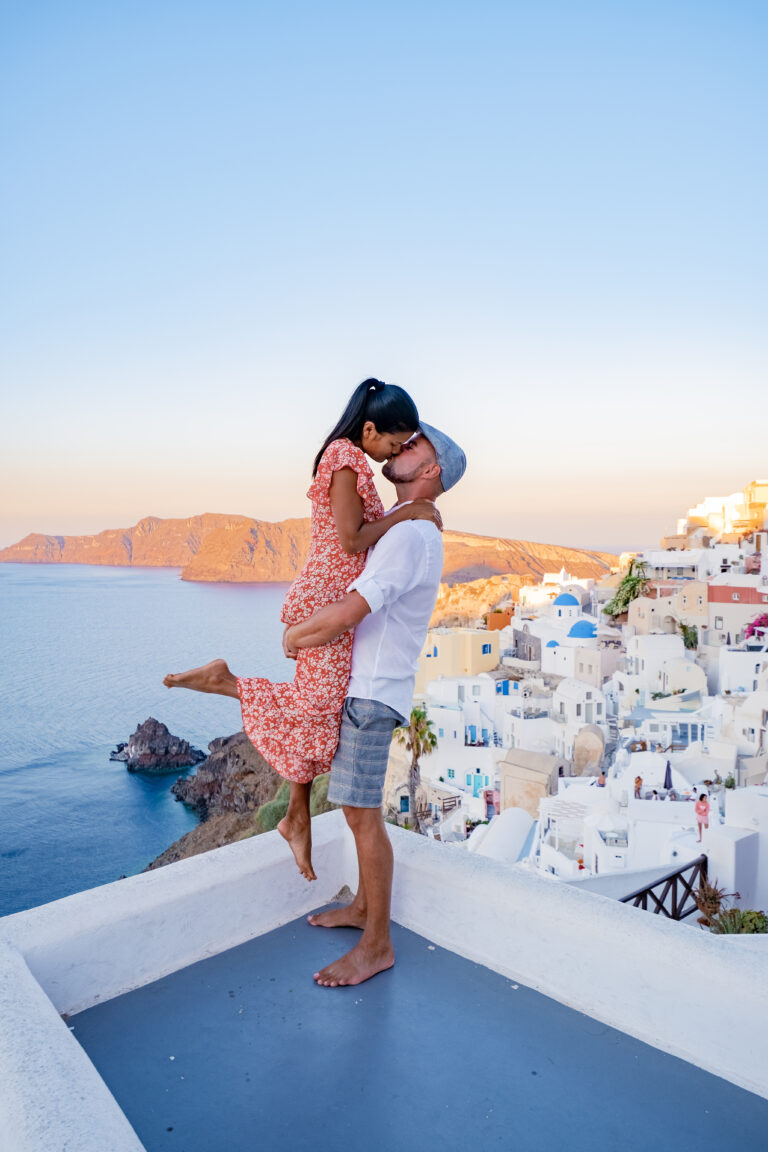 Santorini,Greece,,Young,Couple,Mid,Age,European,And,Asian,On