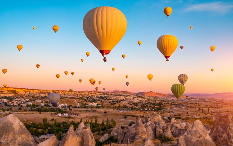 Bright,Hot,Air,Balloons,In,Sky,Of,Cappadocia,,Turkey